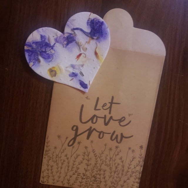 Seed paper heart with let love grow envelope